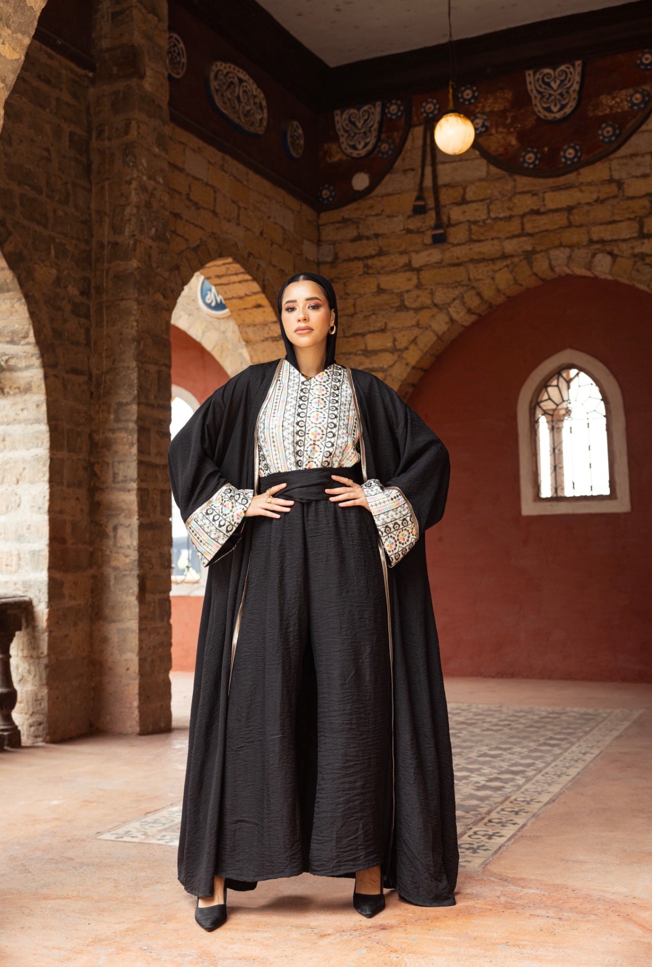 Timeless Black jumpsuit and cardigan