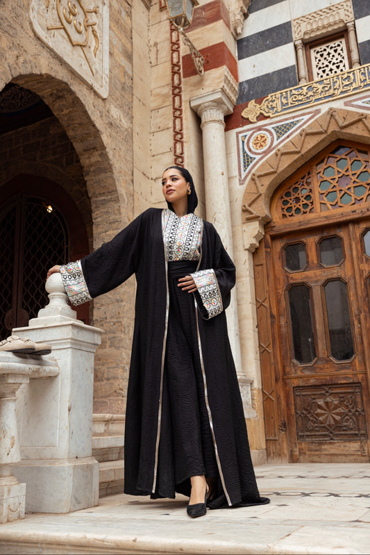 Timeless Black jumpsuit and cardigan