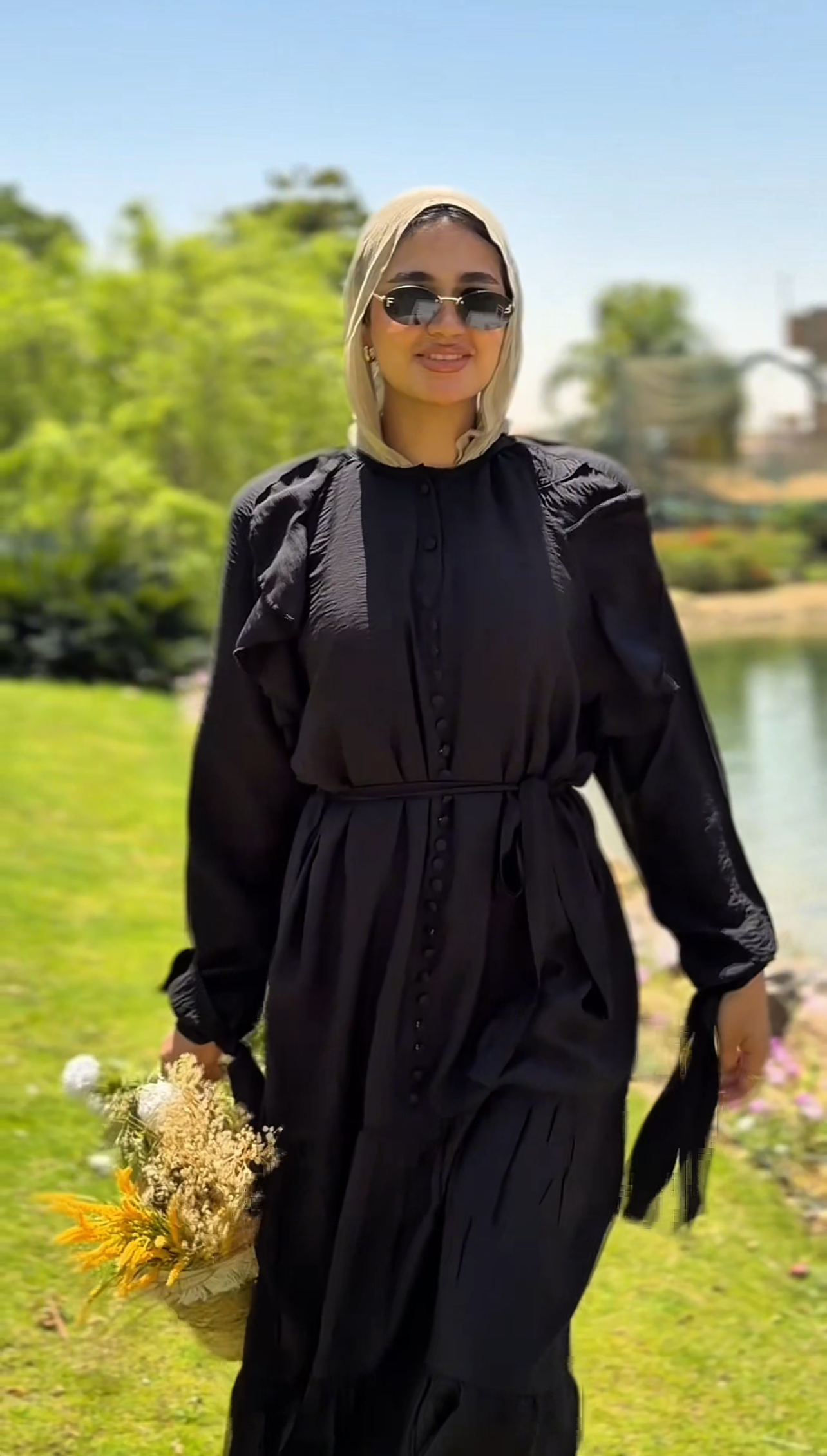 The Ruffled blooms dress in noir